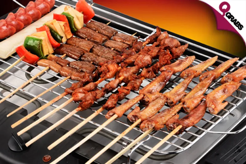 From QR95 Make Dinner Sizzle with a Smokeless Electric BBQ Grill! (QR398 Value)
